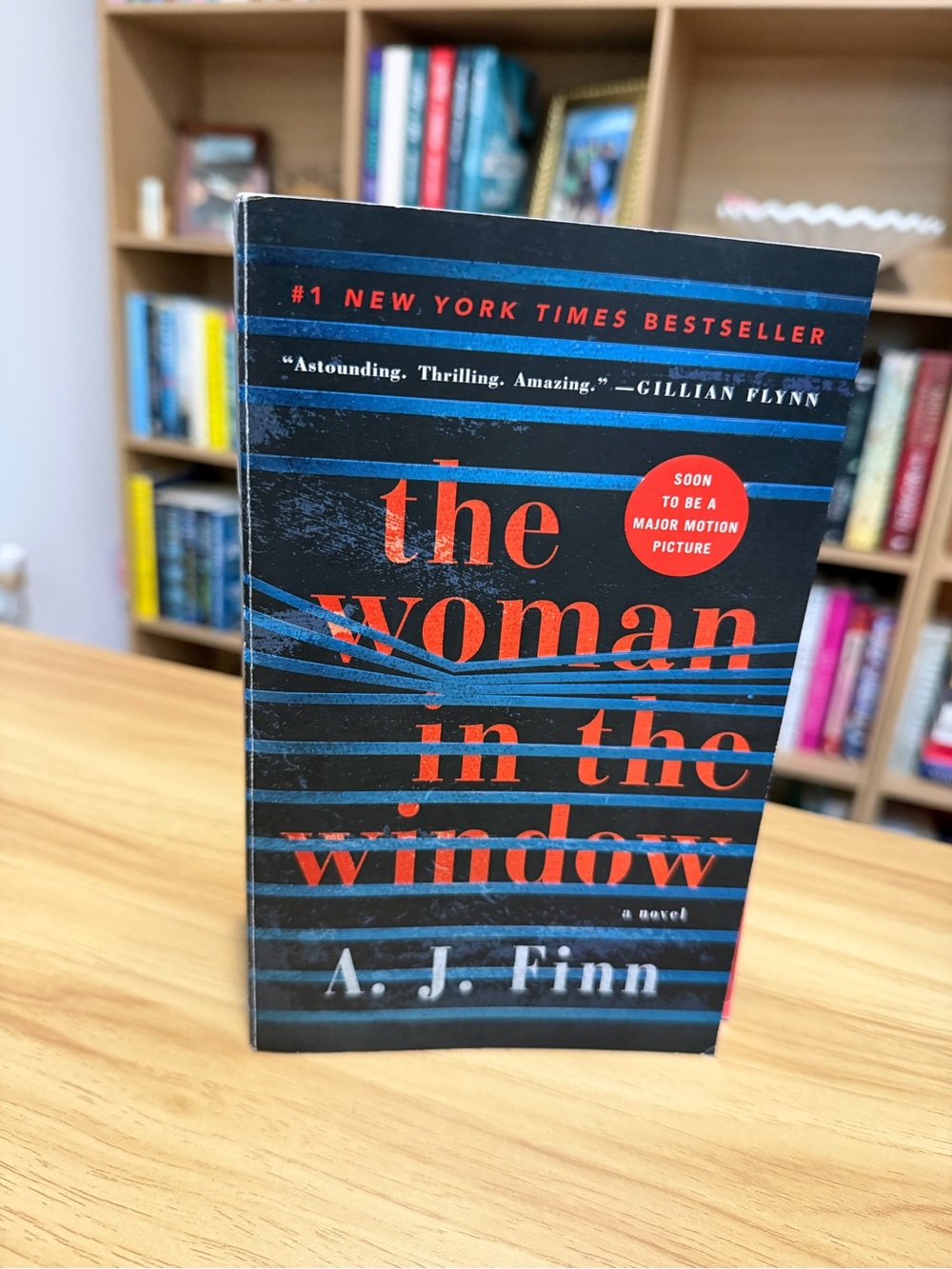 The Woman in the Window by A. J. Finn - Black & Red Paperback Novel